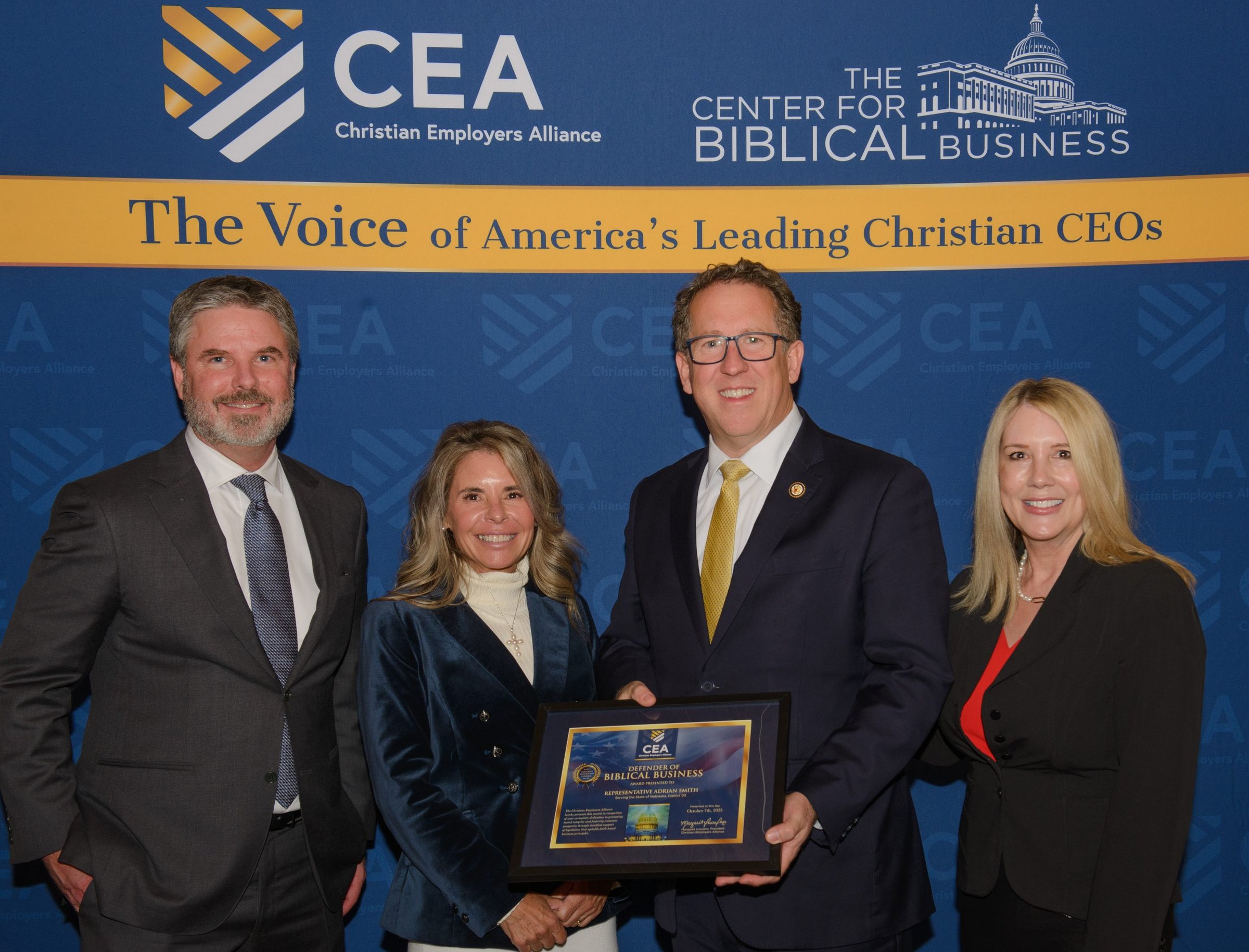 CEA President Margaret presenting the Defender of Biblical Business award at the CEA Policy Summit